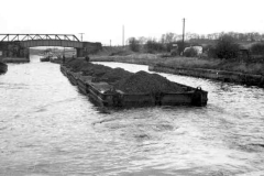 A train of compartment boats.