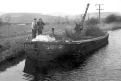 The crane equipped barge CALDER.