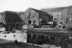 A barge moored in Wakefield Pool.