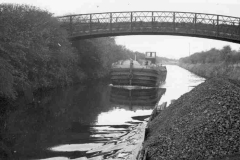 Motor barge Ethel passing under Sykes Bridge No 26.