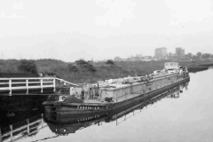 Barge Fossdale H at the entrance to a lock at Leeds.