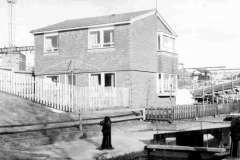 Modern housing near a canal.
