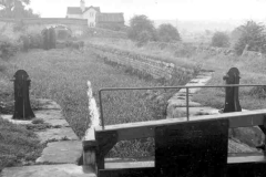 An abandoned, grassed over canal