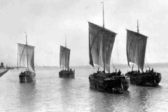 Four unladen Humber keels under way.