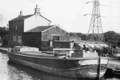 THOMAS moored close to a bridge.