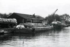 Barges Enterprise & Service discharging sand at Rawcliffe Bridge wharf.