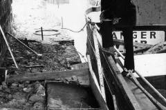 Inspecting damage to a canal towpath.