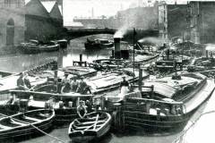 A postcard of the River Aire in Leeds.