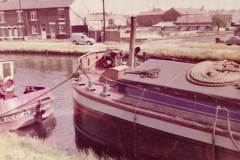 Two moored motor barges.
