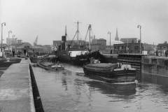 Four barges and PERELLE II in Ocean Lock.