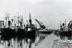Numerous vessels around West Dock.