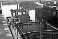 BARBARA HOLBEACH entering a lock.