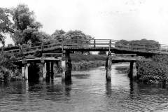 A  wooden canal bridge.