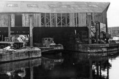 Barge Doris Hunt under a covered wharf, possibly in Leeds.