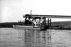 Loading coal by conveyor fed coal drop.