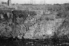 A canal brick retaining wall.