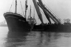 Raising the MV Birgit Muller on the River Ouse.                         