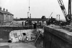 A sunken barge in Barge Dock.