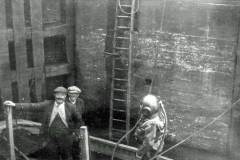 A diver and his support team.
