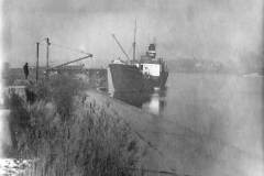 The oil tanker SS Pass of Leny is seen mooring at a jetty.