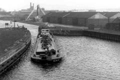 Barge Beldale H passing through Castleford Flood Lock No 9.