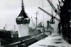 Loading a barge in wintery conditions.