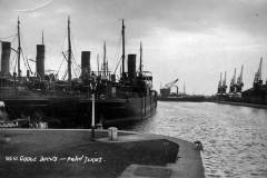 A postcard of four steamships in Goole Docks.