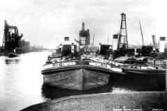Barge Dock, with a number of steam tugs.