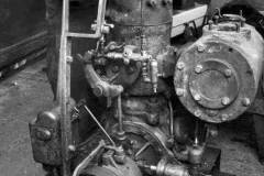 Working on a boat engine.