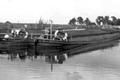 Two moored dumb barges.