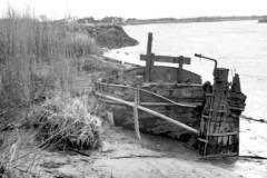 Wooden barge quietly rotting away