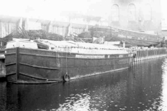 SPIDER T moored on a waterway. 
