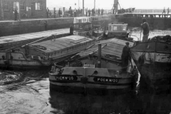 Four motor barges in Ocean Lock.