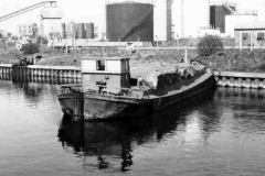 Moored bow-on to the canal bank.
