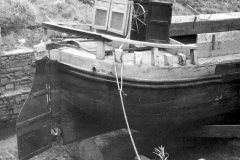 A 'West Country' size motor barge in dry dock.