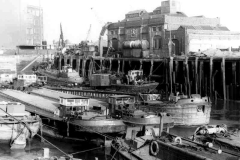 Numerous barges in Hull's Old Harbour.