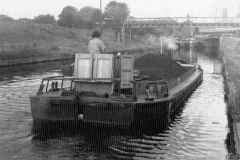 A barge approaching Thornhill Double Locks.