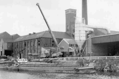 A barge at E W Rawson's wharf.