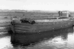 The moored motor barge Frugality.