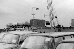 Discharging Wartburg cars.