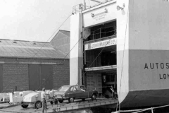 Hay balers being towed aboard Autoroute.