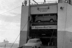 Autostrada unloading Volkswagen cars.