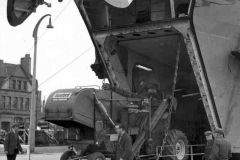 Discharging combined harvesters.