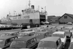 Volkswagen cars being unloaded from Autostrada.