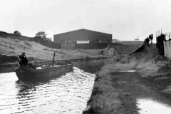 A narrowboat and draft horse.